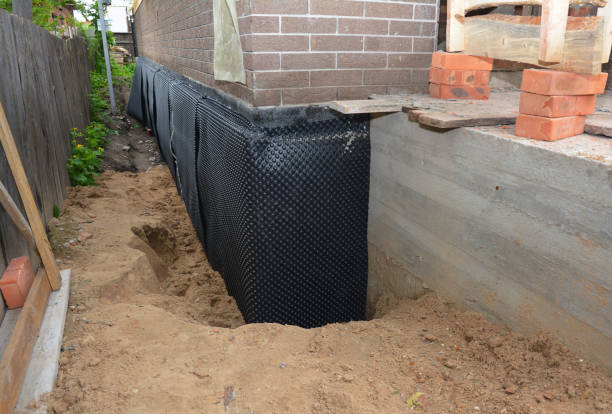 Happy homeowners after waterproofing job in Princeton